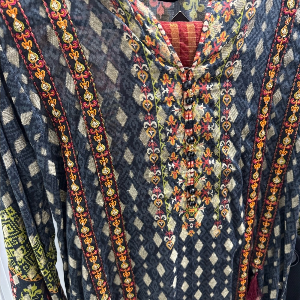 Women’s dresses beautiful multi color and Perl’s on it